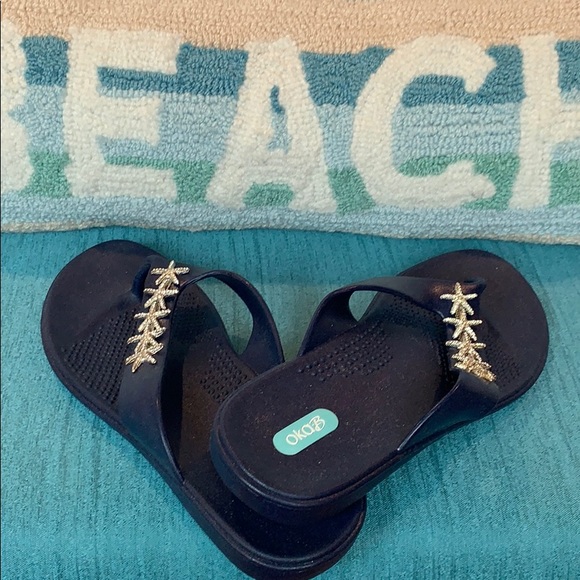 navy blue flip flops with bling